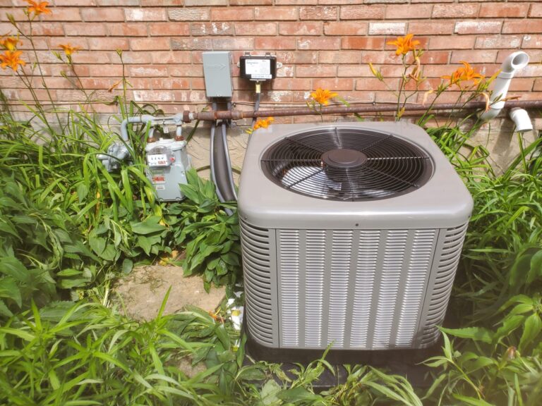 Outdoor air conditioner unit sitting outside of Erlanger, KY, home.
